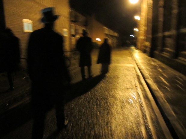 A spooky scene: walking the streets of York for a wandering production of A Christmas Carol.